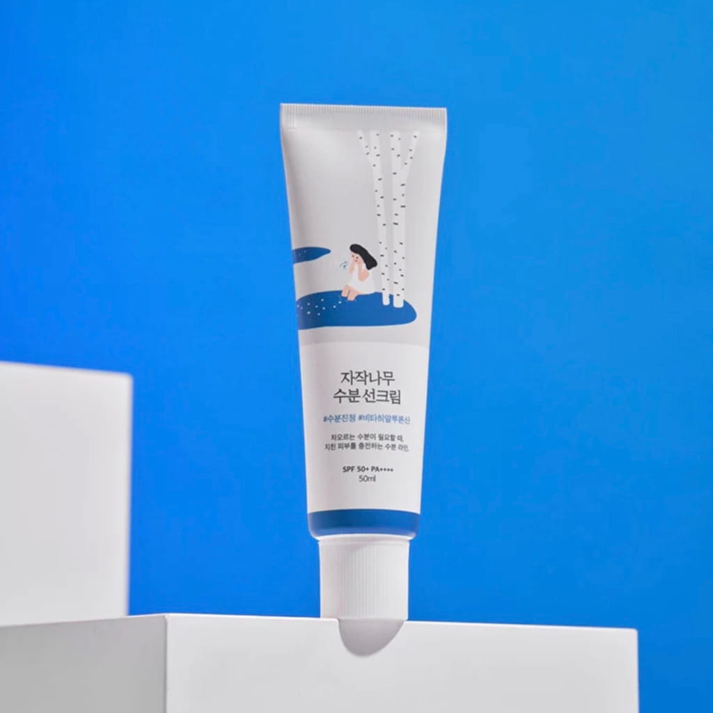 Protection solaire hydratante K-Beauty Round Lab formulée avec de la sève de bouleau d'Inje et de l'acide hyaluronique.
