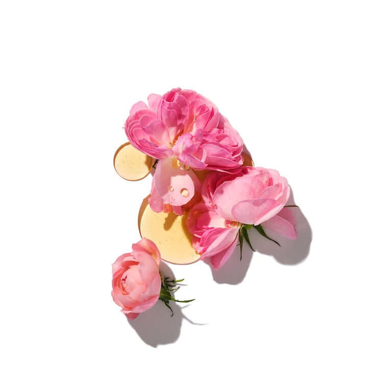 A delicate presentation highlighting Bulgarian Rose, the key ingredient of this ISOI treatment. This precious rose, harvested only once a year, is at the heart of the formula to infuse the skin with vitamins, soothe redness, and restore a natural, vibrant glow.