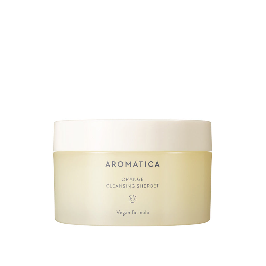Fondez pour Orange Cleansing Sherbet de la marque coréenne AROMATICA, baume nettoyant à base d'huiles végétales avec sa "texture sorbet" qui se fond en huile au contact de la peau.